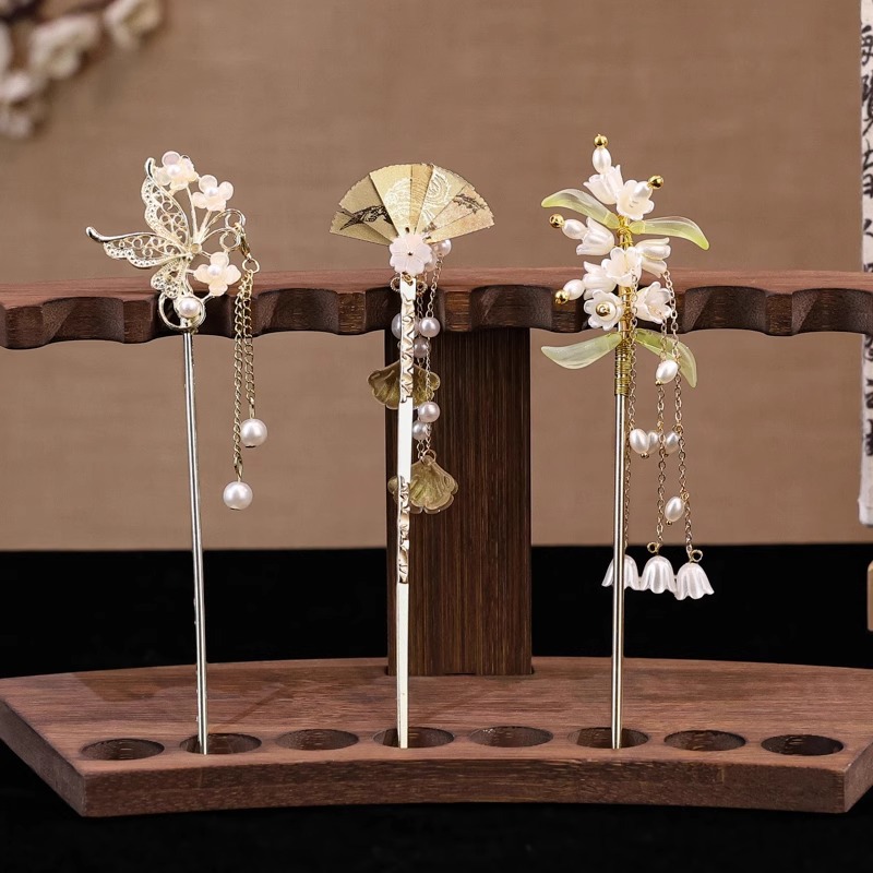 Nueva horquilla china 2025 nuevo estilo estilo antiguo horquilla mujer falda de cara de caballo de alta calidad estilo nacional horquilla de madera paso a paso horquilla tocado