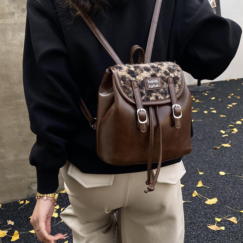 Mochila popular coreana para niños y niñas, mochila de estilo de estilo de la universidad, nueva mochila de invierno y otoño para niños estampados de lana