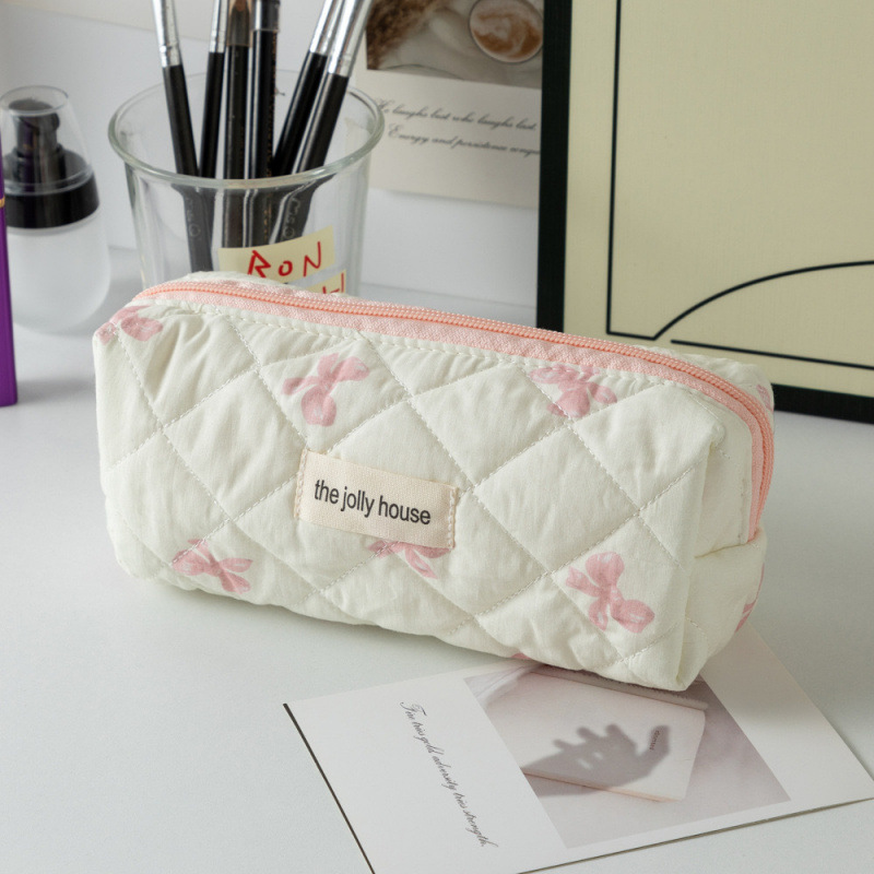 Capacious handheld cute cosmetic bag with bow for traveling