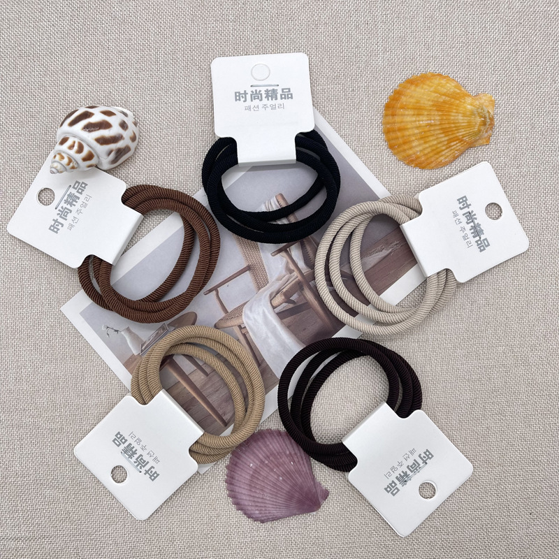 Dongdaemun estilo coreano hilo colorido accesorios para el cabello cuerda de pelo asequible banda de pelo de alta elasticidad de tres paquetes de banda de goma de dos yuanes tienda al por mayor image 8