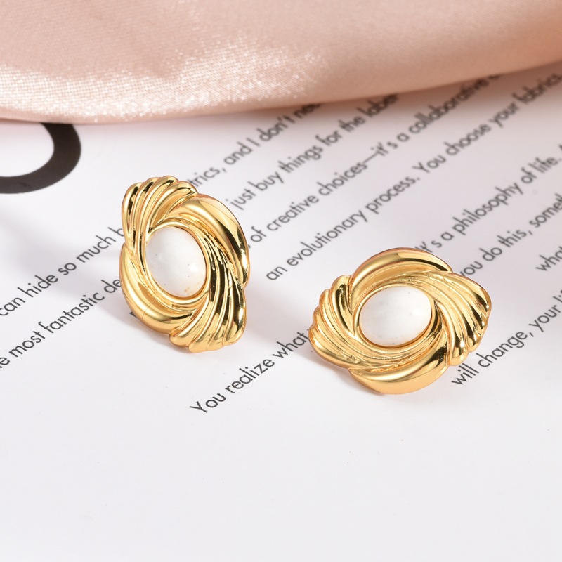 Europa y los Estados Unidos transfronterizos retro pendientes turquesa pendientes de moda incrustados con perlas irregulares joyas de pendientes de acero inoxidable