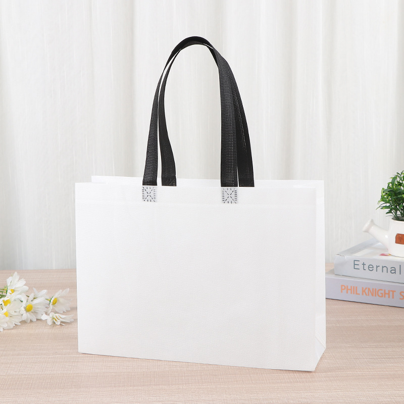 Bolsas de tela no tejida tiendas de souvenirs de viajes de madres y bebés en línea bolsa de compras de mano engrosada bolsa de mano image 13