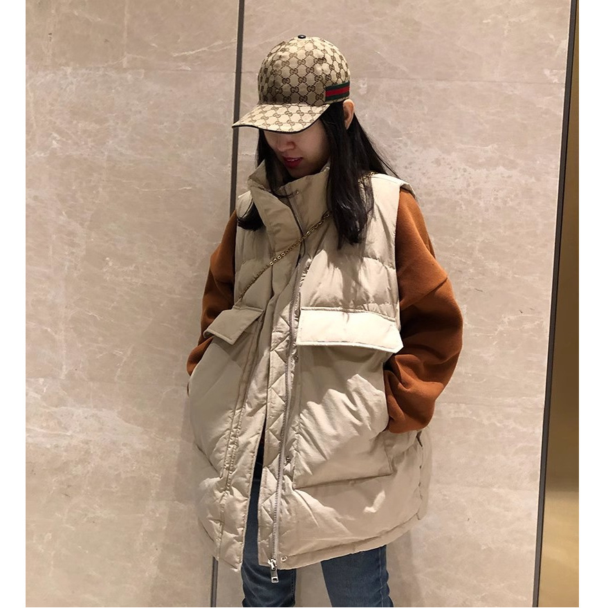 2023 otoño e invierno nuevo estilo coreano más tamaño medio-largo abajo Chaleco de algodón Chaleco de las mujeres chaleco suelto todo fósforo abrigo moda