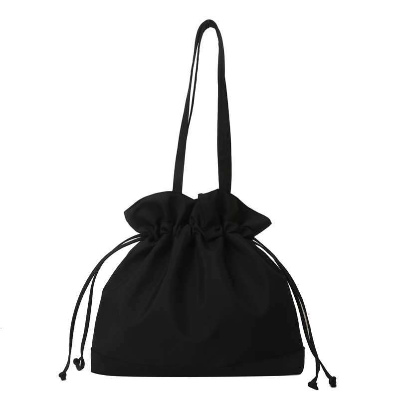 2023 nuevo estilo occidental casual color sólido Portátil Bolsa grande para las mujeres Solo bolso de hombro de invierno de moda cordón bolsa de almacenamiento de gran capacidad