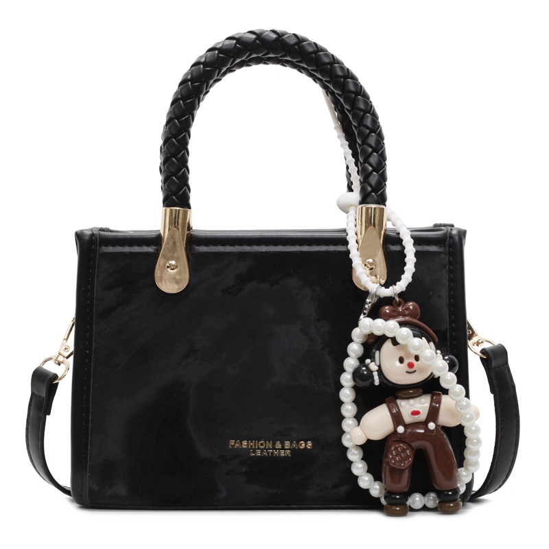 Bolso cuadrado pequeño de mano popular transfronterizo para mujer 2025 nuevo bolso de hombro casual simple bolso de mensajero de moda de alta gama