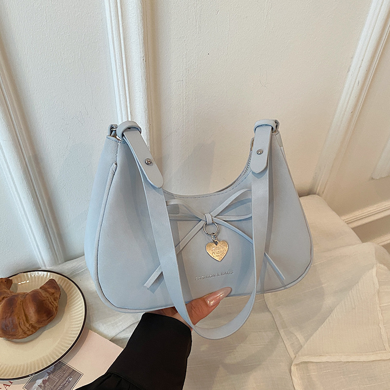 Borsa a tracolla da donna con fiocco per il pendolarismo_voghion.com