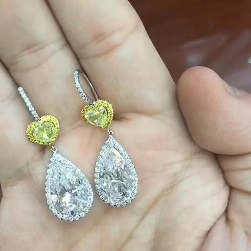 Brincos Cao Shi para mulheres com revestimento de duas cores e micro conjunto AAA Zircon Stone Fashion Versátil Brincos de noiva_voghion.com