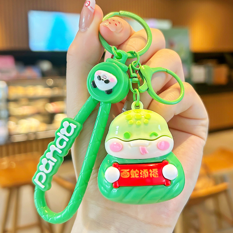 2025 nuevo estilo zodiaco zodiaco zongzi llavero lindo dibujos animados dragón serpiente caballo muñeca pareja mochila bolso colgante