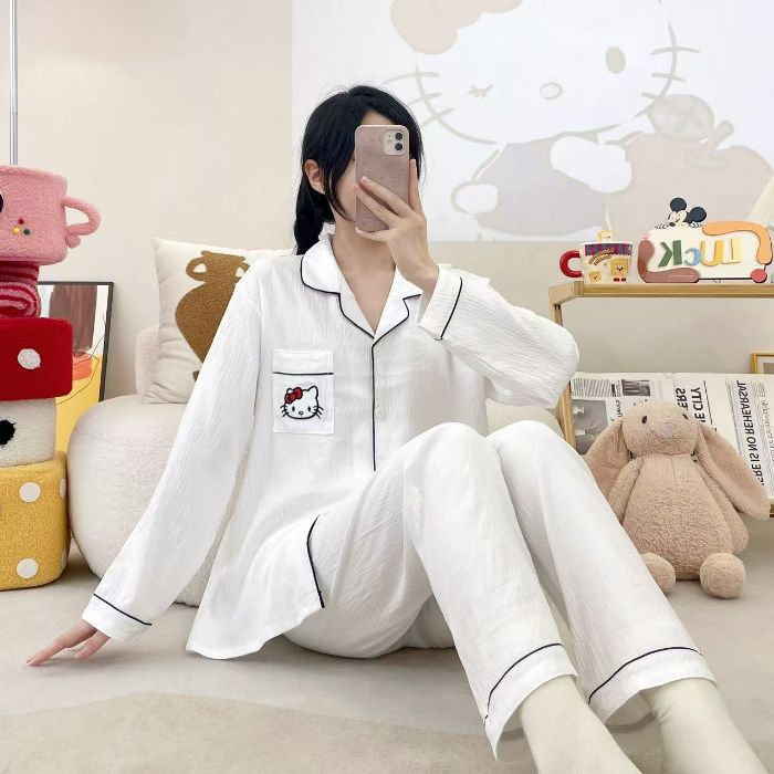 Venta al por mayor transfronteriza de pijamas de algodón de nube para mujer hellokitty pantalones de manga larga bordados de bolsillo rebeca solapa servicio a domicilio