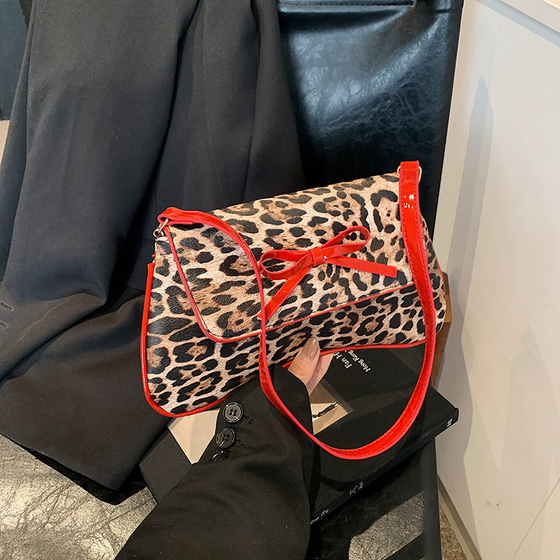 Bolso de leopardo nuevo estilo retro coreano arco de moda PU estilo exterior bolso de hombro axilar