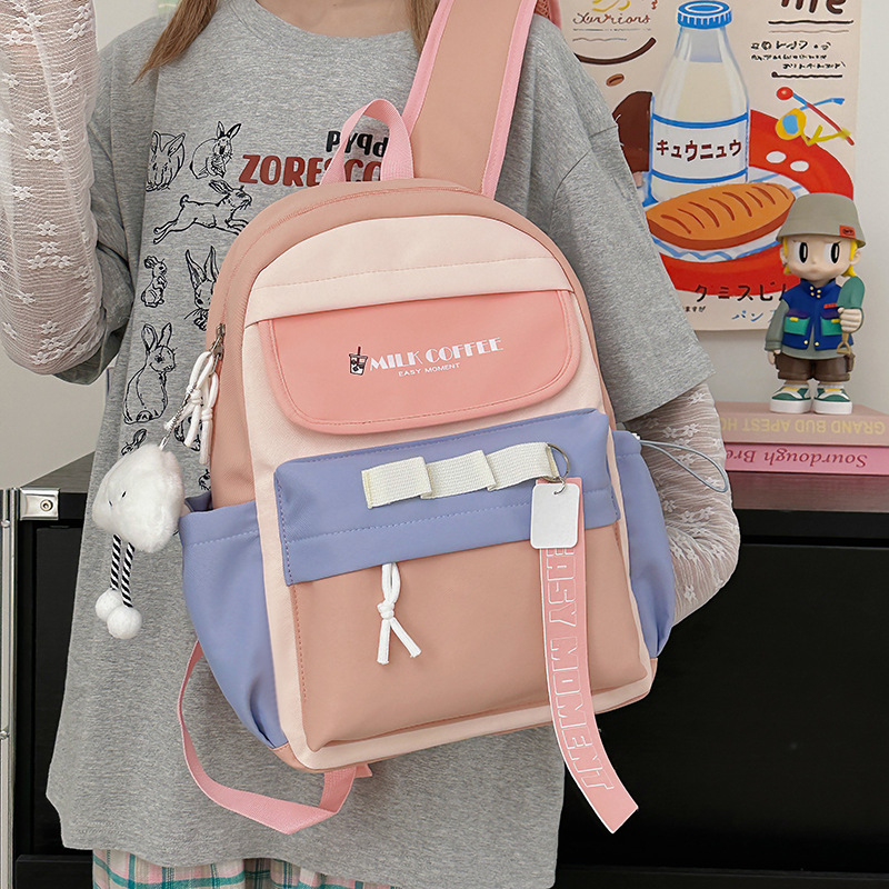 Mochila escolar de estudiante de doble bolsillo con letras de estilo universitario Versión coreana de la mochila de gran capacidad para estudiantes de secundaria y preparatoria al por mayor para niñas de alto valor