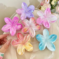 欧米の国境を越えた卵の花がリゾート風のいばらの花を挟んで女性の後頭部を挟んでサメの魚を挟んで卸売りをします。