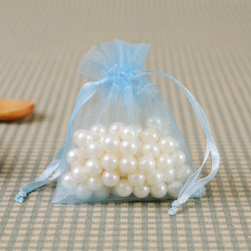 厂家供应素色透明欧根纱珍珠纱束口袋 喜糖饰品礼品包装纱袋