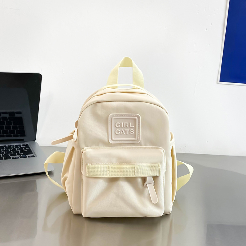 Nuevo estilo japonés de los niños de color sólido mini mochila lindo niños y niñas mochila simple kindergarten schoolbag