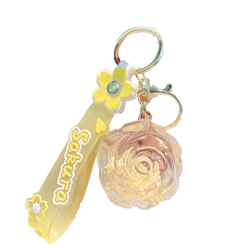 Llavero de rosa de aceite creativo lindo líquido arenas movedizas colgantes pequeños bolsos accesorios pareja pequeños regalos al por mayor