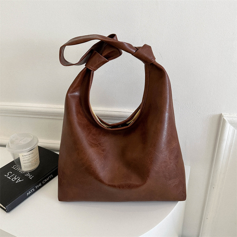 Nuevo estilo japonés y coreano relajado bolso de cuero suave debajo de las axilas, bolso de mano de gran capacidad, nicho simple bolso de hombro
