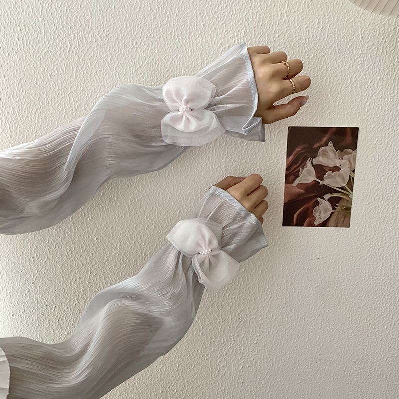 Mangas de hielo, mangas de protección solar, verano, nuevo estilo, temperamento elegante, gasa de malla, lazo, mangas abullonadas sueltas, protección de mangas, protección de brazos