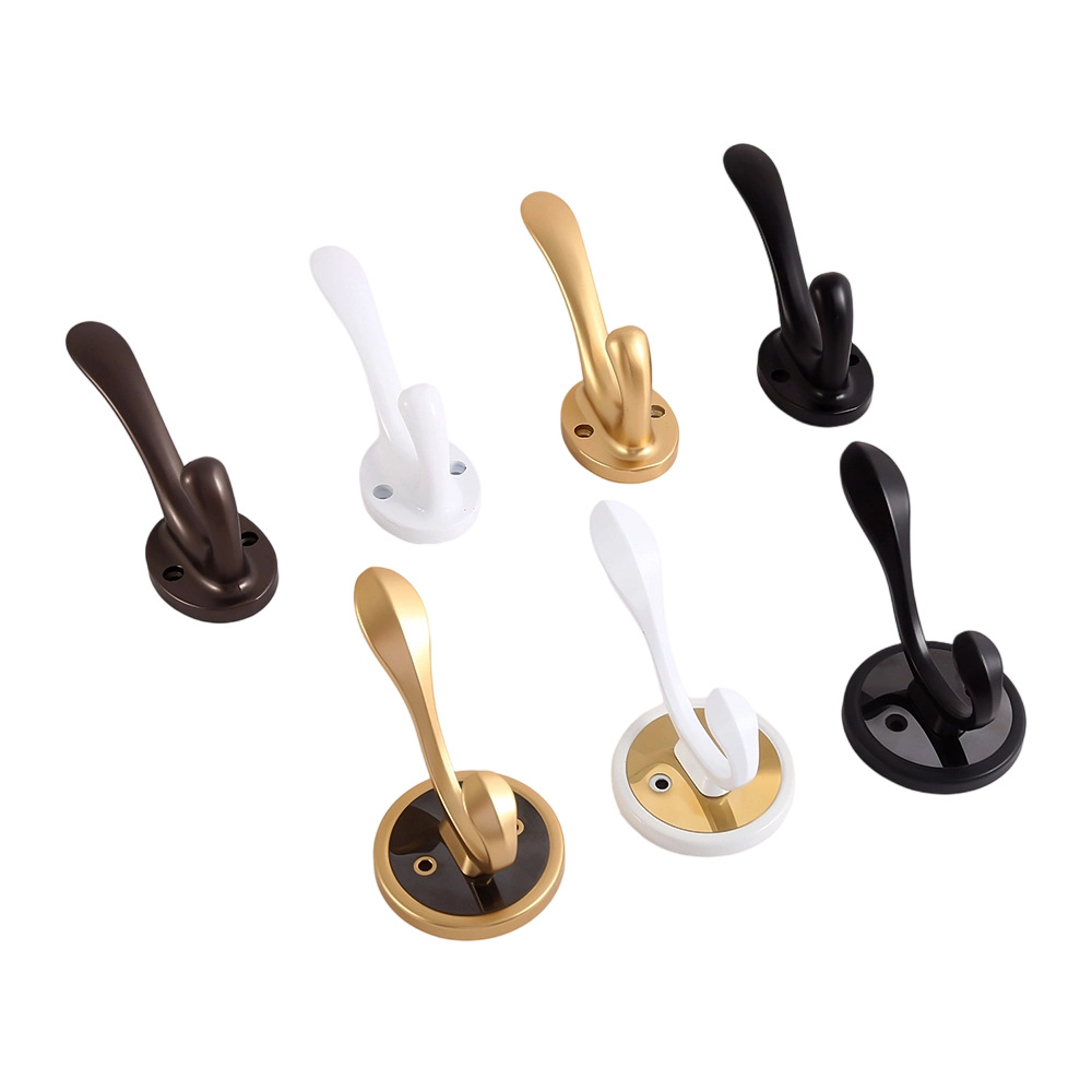 Creative metal fixed coat hooks for household clothes behind the…