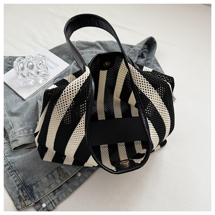 Korean summer new striped woven bag, casual vacation and laid-back style tote bag, hand and shoulder commuter tote bag undefined