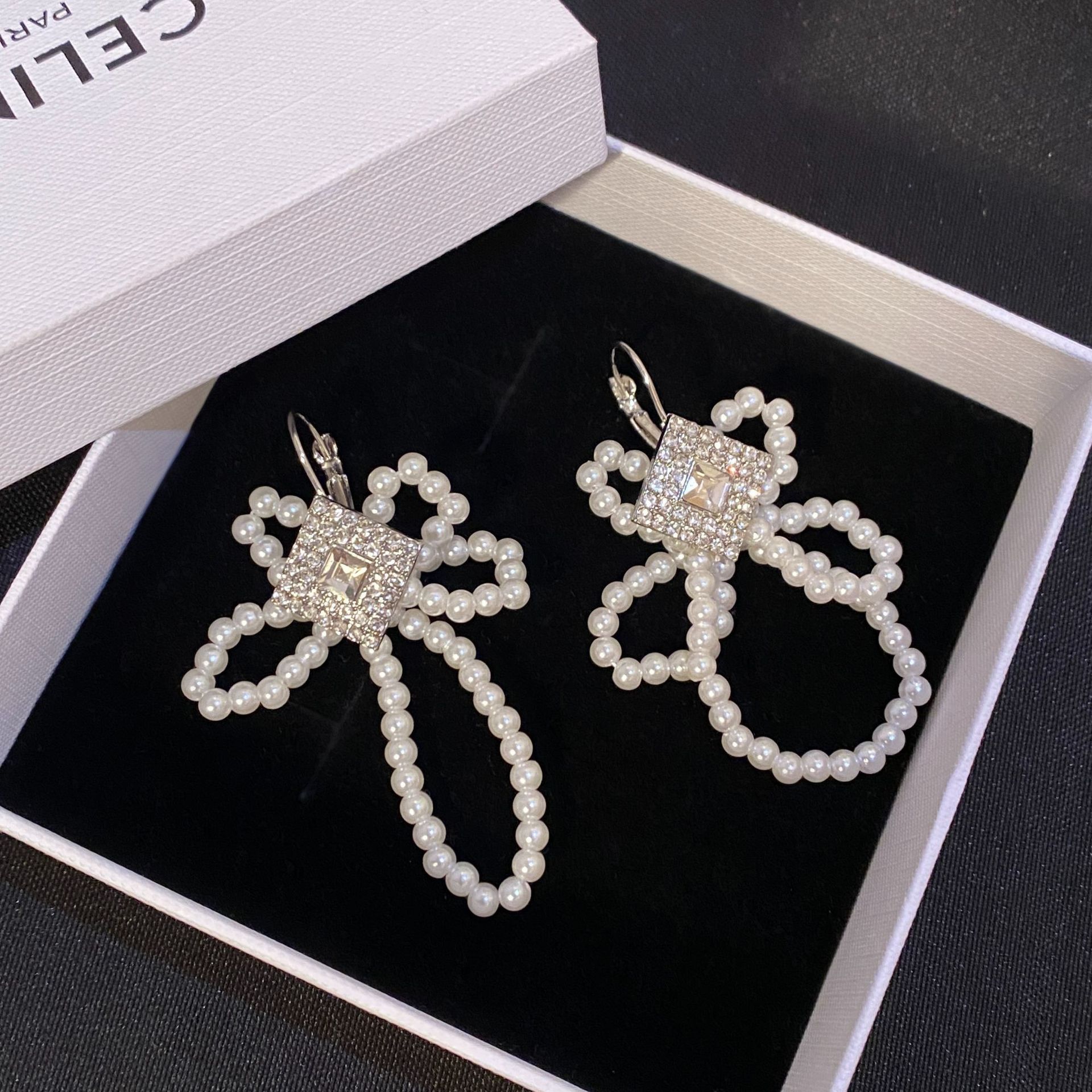 Nueva borla pendientes en línea celebridad diamante mariposa flor S925 pendientes de perlas moda elegante pendientes largos de adelgazamiento