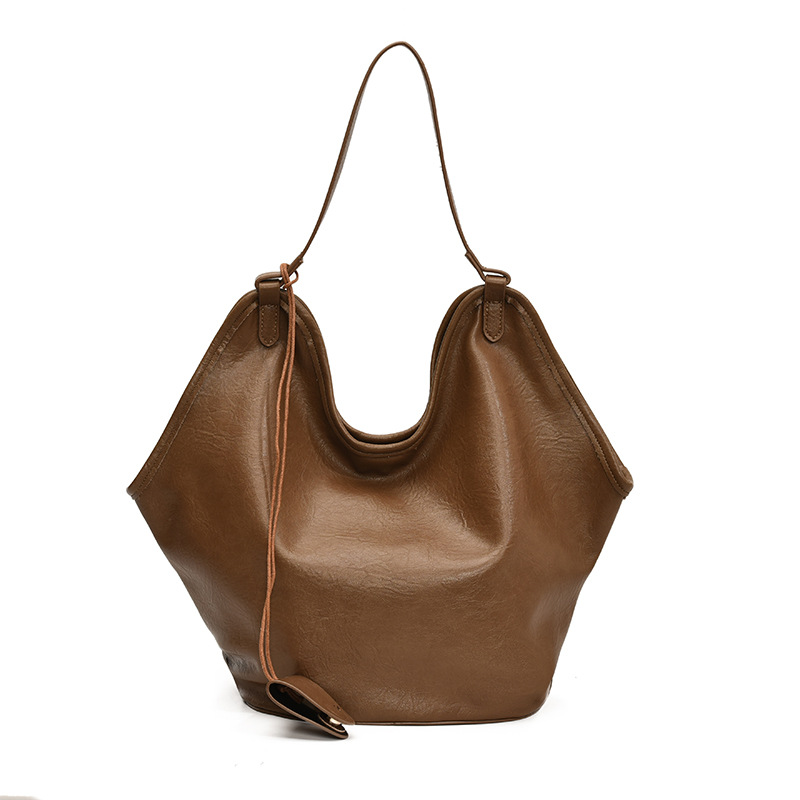 Bolsa de cubo transfronteriza de gran capacidad, bolsa de viaje retro de mujer 2025, otoño y invierno, nueva moda, bolsa de brazo, bolsa de hombro universal