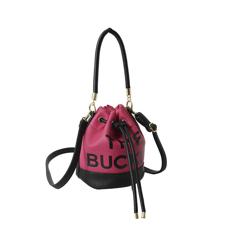 Bolso de hombro femenino casual todo-fósforo diseño de nicho sentido contraste color costuras cubo bolso de mano moda tendencia bandolera