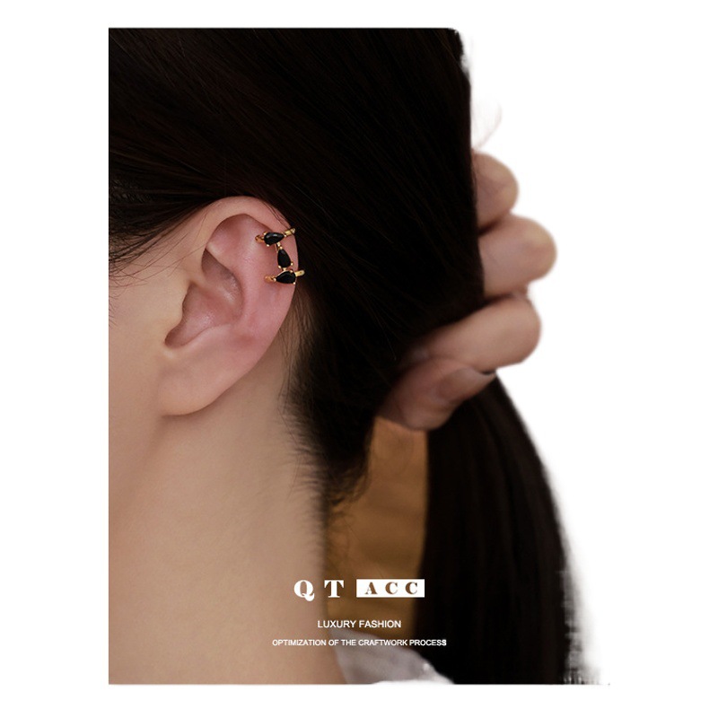 Latón chapado en oro real de 18K Corea del Sur retro exquisita en forma de gota de circonio negro línea de diseño sentido oído hueso clip de moda pendientes frescos