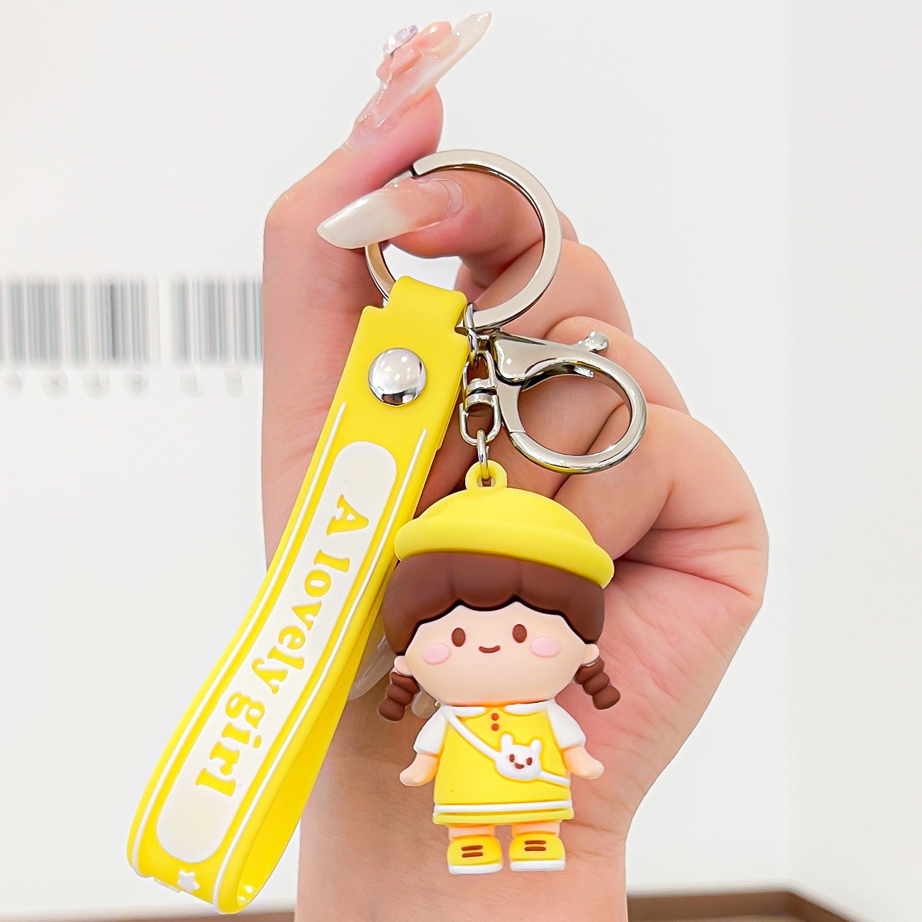 Venta directa de fábrica llavero colgante pequeño muñeca tridimensional llavero de coche mochila escolar colgante puesto al por mayor productos pequeños