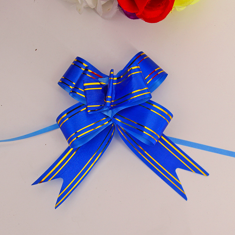 Fabricante al por mayor de empaques de flores para regalos navideños, cinta con borde dorado, 30 flores medianas atadas a mano.
