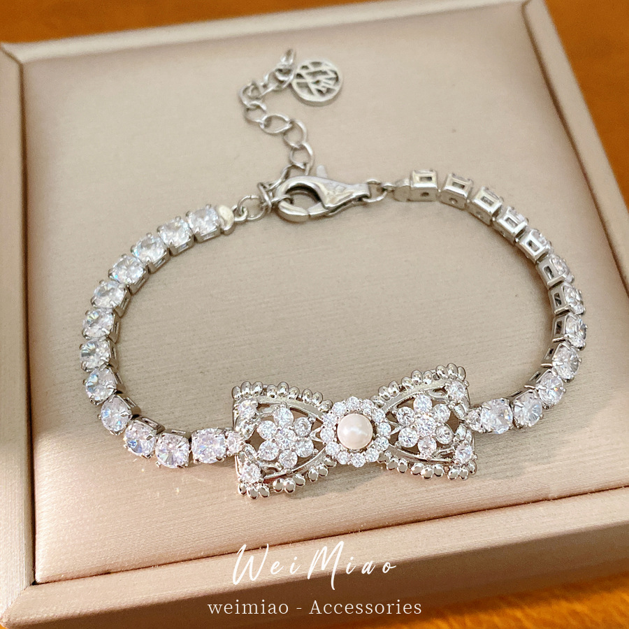 Zircon plata perla pulsera arco pulsera de moda coreana dulce y fresco pulsera de lujo ligera alta sensación de joyas de mano versátiles mujeres
