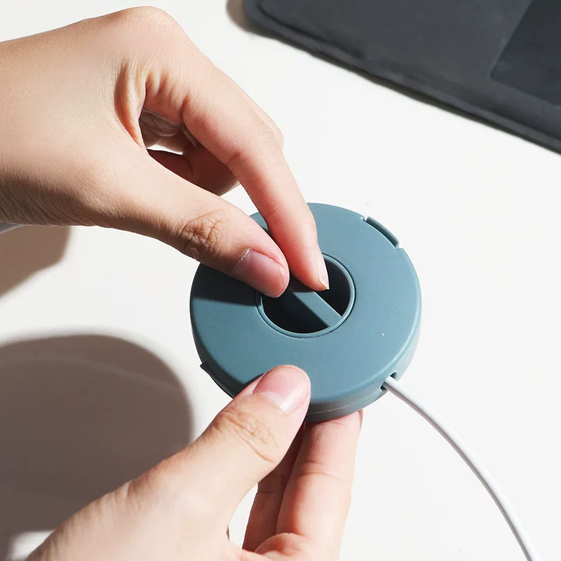 Small handheld portable round rotating storage box, mobile phone, charging cable