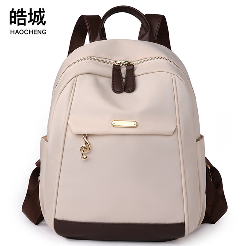 Bolsos para mujer 2023 nueva mochila casual para mujer de nailon moda salvaje color contraste mochila de viaje mochila escolar al por mayor