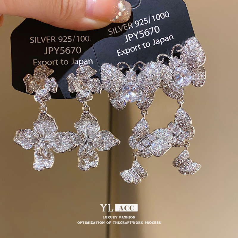 シルバー針ライト高級スタイルジルコン蝶の花のイヤリングヨーロッパとアメリカのファッション個性ニッチ気質ハイエンドイヤリング女性用|undefined