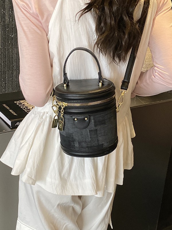 Bolsa de cilindro coreana de diseño popular de nicho 2026 nueva moda simple de hombro portátil bolso de cubo