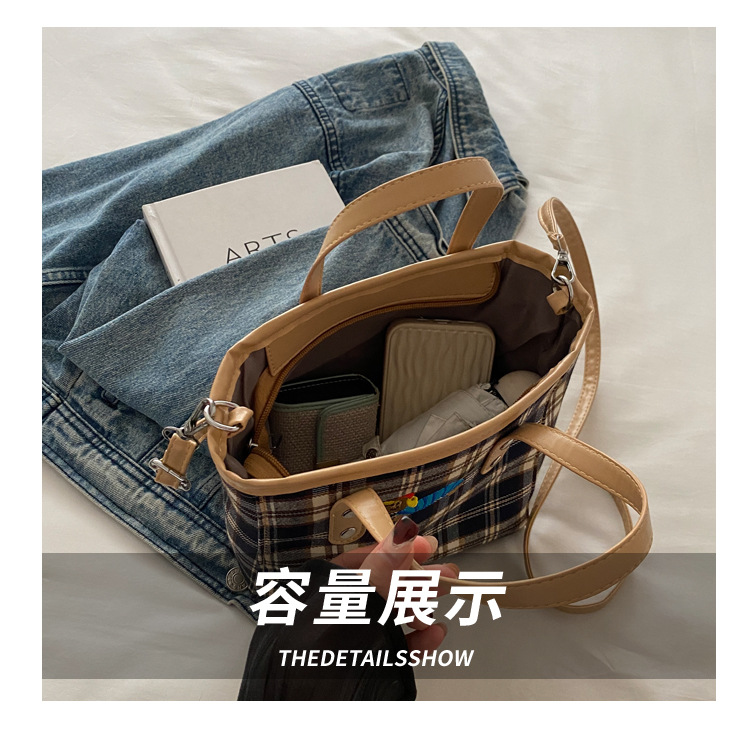 Cross-border personalized hand-carried fashionable and casual bucket bag for women, new autumn 2024 collection, contrasting color striped single-shoulder quality crossbody bag undefined
