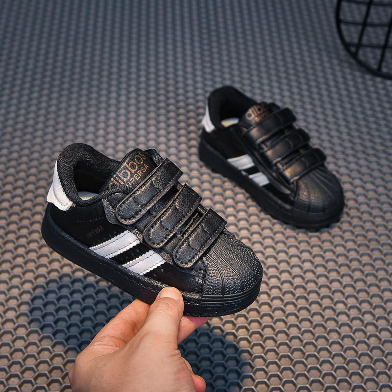 2025 primavera y otoño nuevo estilo para niños cabeza de concha zapatos casuales niñas cuatro estaciones zapatos blancos zapatos deportivos con velcro para niños