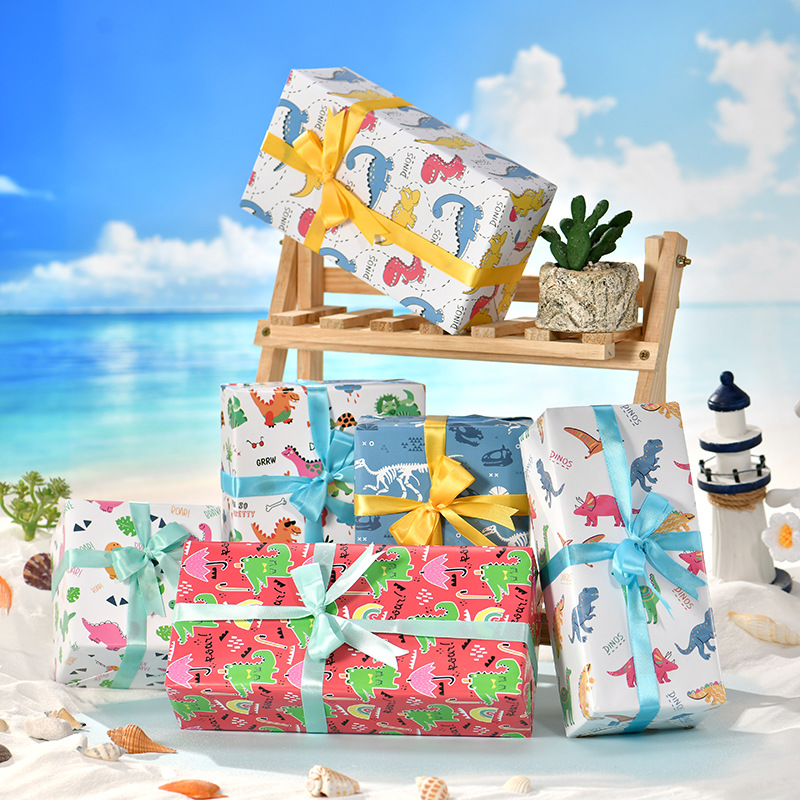 Nuevo papel de embalaje de regalos transfronterizos Día de los niños cartón de dibujos animados papel de caja de regalo de cumpleaños lindo papel de embalaje de regalos de dinosaurios animales