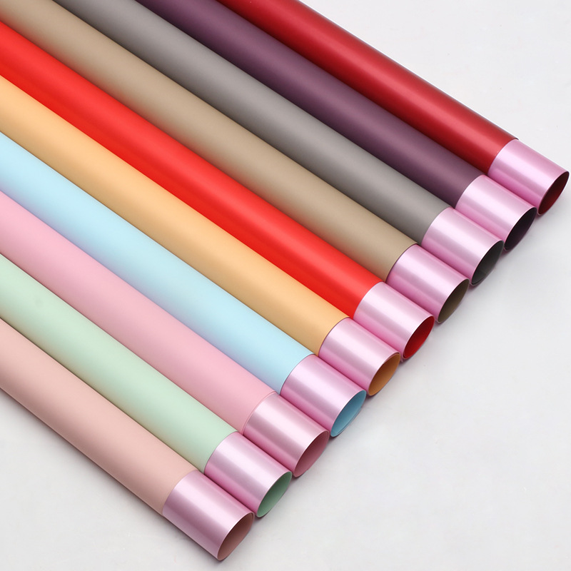 Rosa brillante señora flor embalaje de papel de película plástica impermeable perlada hecha a mano DIY florista materiales de flor al por mayor