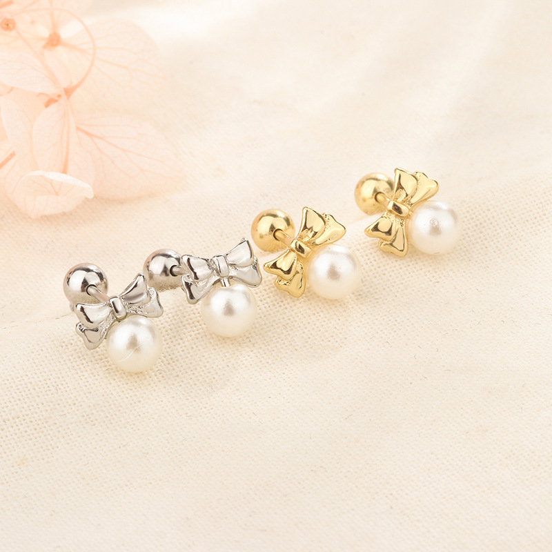 Bow pearl ear studs ear hole screw twist buckle earrings 2023 new popular niche earrings