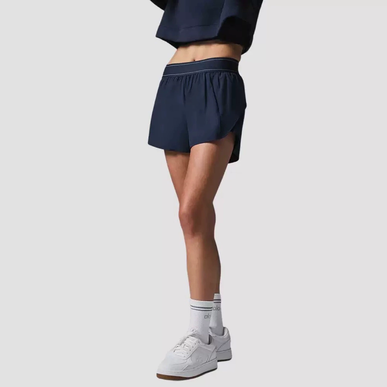 Спортивные шорты для бега на открытом воздухе с быстрой сушкой, антибликовым покрытием, индивидуальной печатью логотипа, изготовленные на заказ для трансграничной экспортной обработки в стиле ALO.