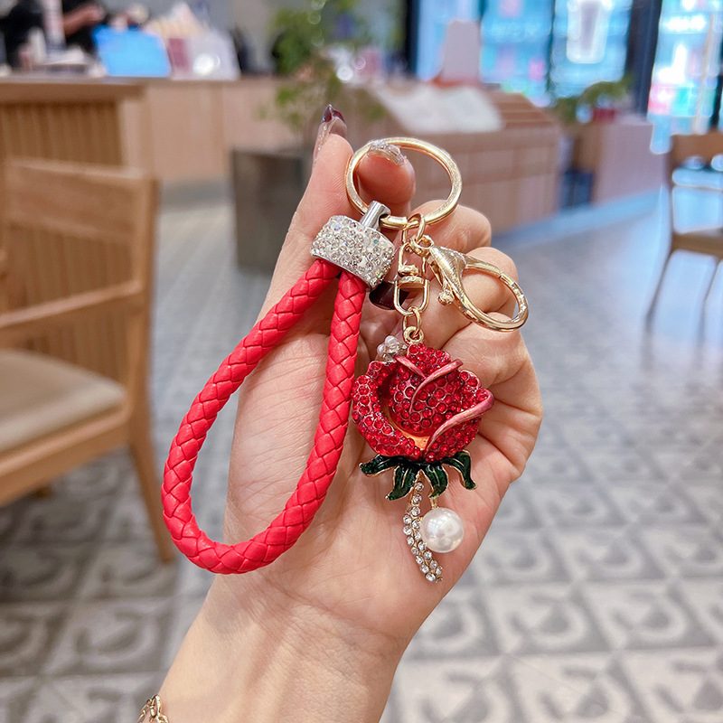 Creativo diamante rosa flor de metal lindos llavero de automóvil coreano bolsos colgantes mujeres transfronterizas