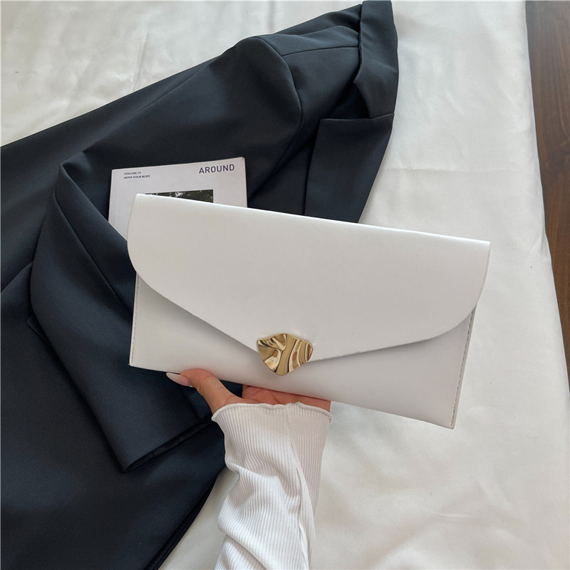 Tendencia de estilo extranjero nueva bolsa de sobres de gran capacidad de otoño 2025 moda casual simple estilo coreano bolso de mano de mujer