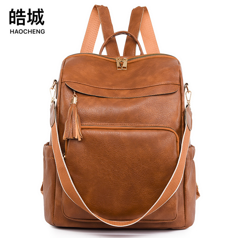 Comercio exterior al por mayor 2023 nuevo estilo coreano retro damas PU mochila de viaje al aire libre simple de moda