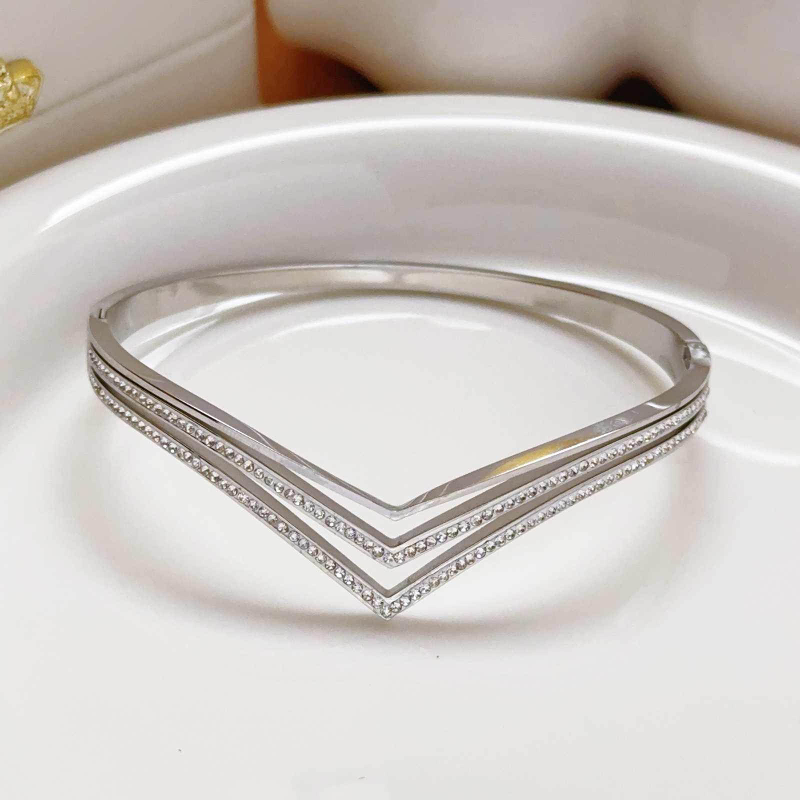 Europa y América pulsera de acero de titanio simple tres filas de diamantes de explosión transfronteriza de moda abertura de pulsera de acero inoxidable
