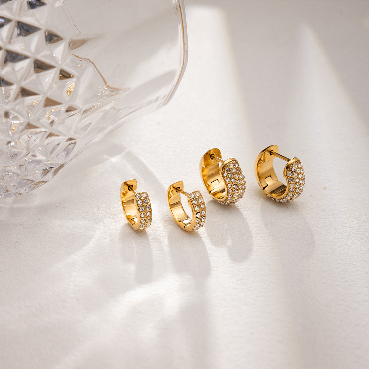 Wanxing acero inoxidable galvanizado 18k oro blanco diamante pendientes de moda clásica comercio exterior transfronterizo pendientes de venta al por mayor
