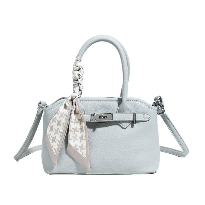 Versión coreana del bolso de nicho 2025 verano nuevo bolso de hombro con patrón de lichi bolso de mensajero casual de todo fósforo mujer