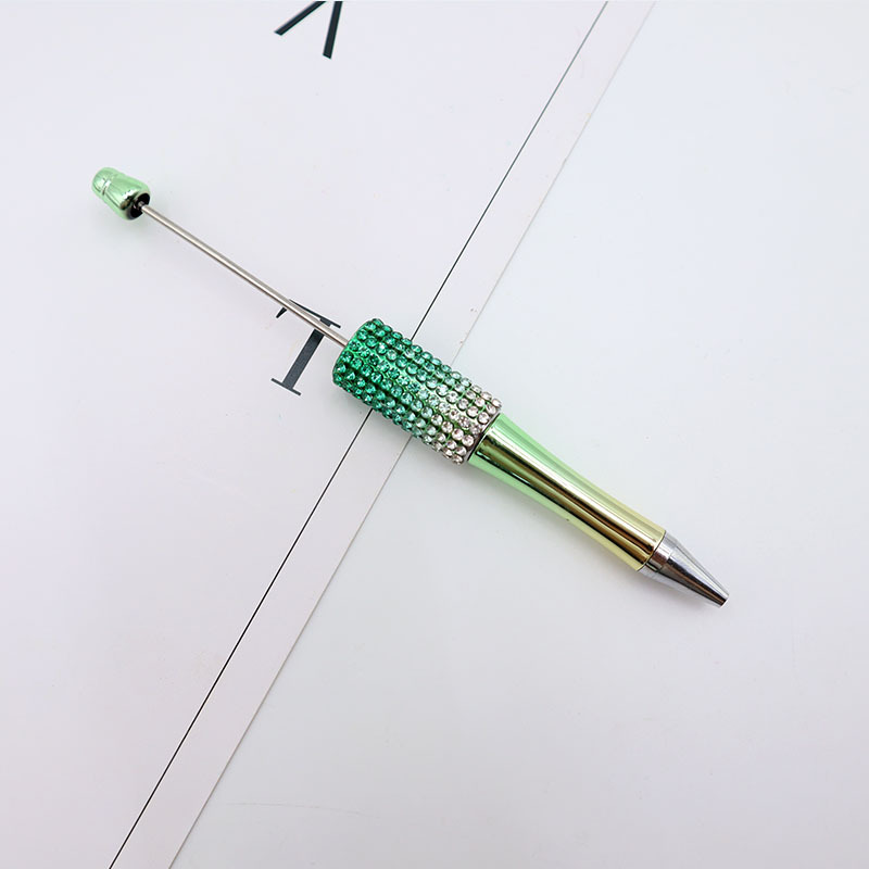 Bolígrafo giratorio de grano lindo de color degradado de tendencia de alto valor Bolígrafo de gomas galvanizado con cuentas de diamantes de bricolaje creativo
