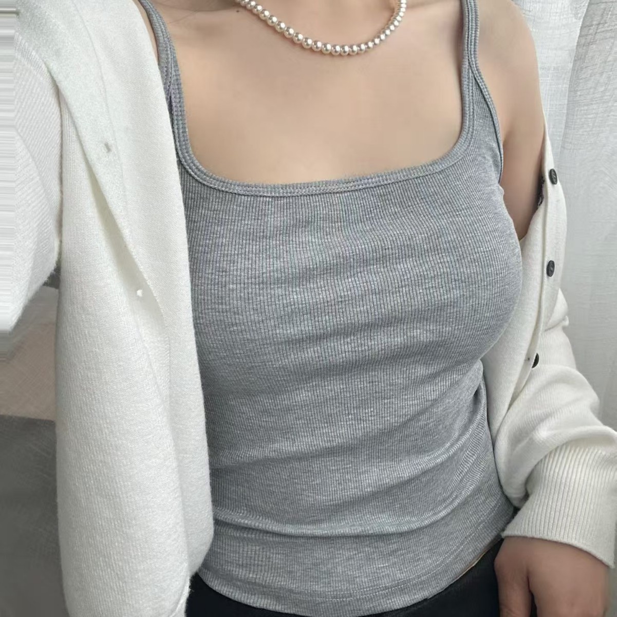 Verano nuevo estilo de moda hilo de bambú algodón fija taza chaleco de cabina simple y cómodo para la piel cabina antibacteriana mujer