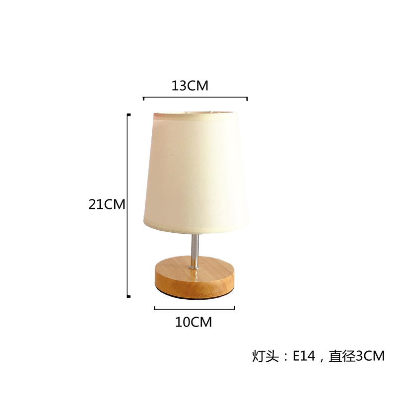 Nordic ins estilo etiqueta plana lámpara de mesa dormitorio de noche estilo coreano japonés transfronterizo lámpara de mesa creativa Retro B & B lámparas de madera maciza
