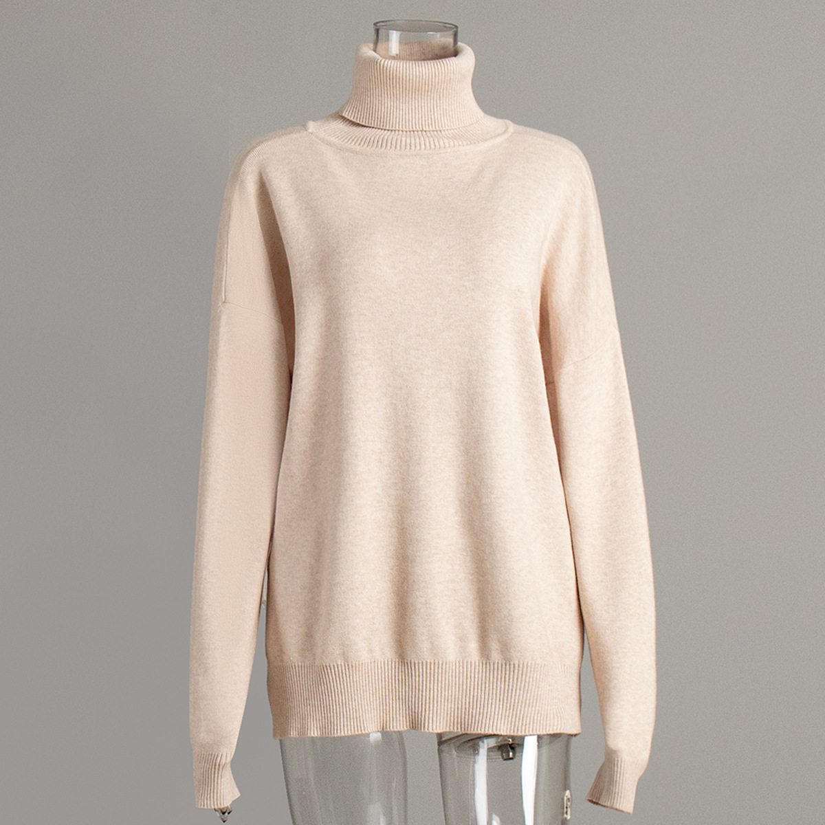 Suéter de cuello alto transfronterizo para mujeres 2025 otoño y invierno nuevo suéter casual estilo europeo y americano bifurcado suéter de punto de color sólido